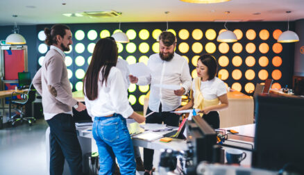Multicultural male and female organizers of meetings collaborati